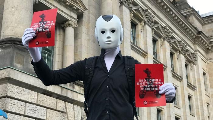 Artists and activists participate in a Campaign to Stop Killer Robots event outside Germany’s parliament, February 2020.