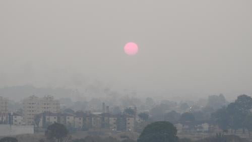The city of Porto Velho, in the western Amazon state of Rondônia, awakes under a dense blanket of smoke at 7 a.m. on August 12, 2019. Rondônia was the state with the fourth most deforestation in the Amazon region in 2019.