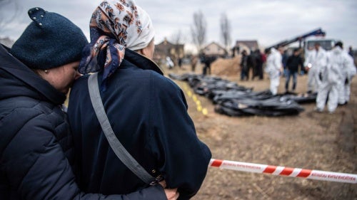Trail of death left behind in Bucha following the Russian forces’ occupation in March. Bucha became a veritable crime scene, with extensive evidence of dozens of summary executions, other unlawful killings, enforced disappearances, and torture, all of which would constitute war crimes and potential crimes against humanity.