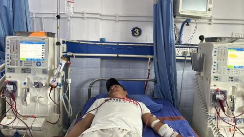 Purna during dialysis that lasts four hours each session, with the costs covered by the Government of Nepal, Butwal, Nepal, July 20, 2023.