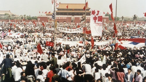 Thousands of pro-democracy demonstrators protest in front of the Gate of Heavenly Peace in Tiananmen Square, Beijing, China, May 17, 1989. 