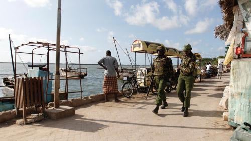 Kenya police officers on patrol in the coastal town of Lamu in June 2014 in the wake of a series of attacks in Lamu and Tana River counties.