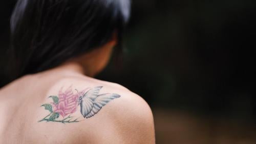 “Jina,” a 22-year-old transgender woman, sports a tattoo of a butterfly—a transgender symbol signifying transformation: “There’s a lot of politicization of the LGBT community at the moment, to distract the public from more important issues.”