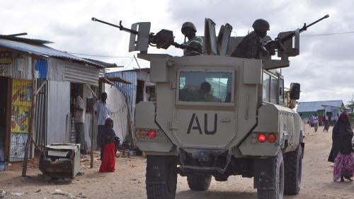 AMISOM troops patrolling the Zona-K camp for displaced people in Mogadishu’s Hodan district in June 2012.