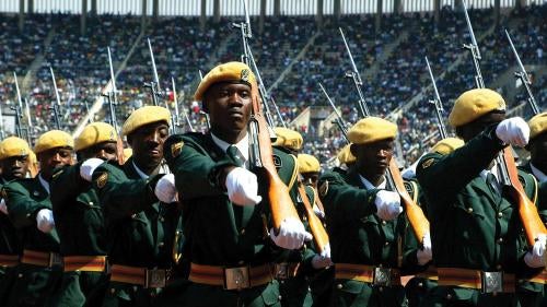 Zimbabwean national army soldiers on parade during the Defense Forces Day celebrations at the National Sports Stadium in Harare, August 14, 2012.
