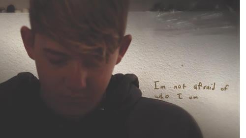 Josh Greer, a student who has been the target of bullying and discrimination in school, writes in his journal in his bedroom in Cache Country, UT, October 2016.
