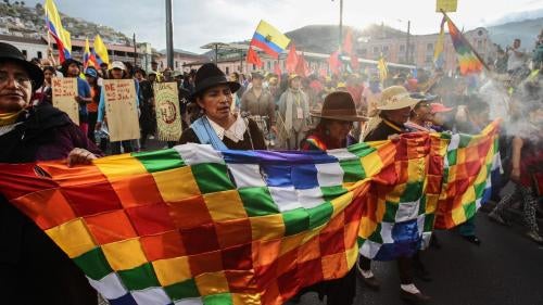 Indigenous people arrive in Quito after marching for 10 days to protest new mining and water law initiatives, as well as a constitutional reform project that would have allowed for indefinite re-election of the president. 