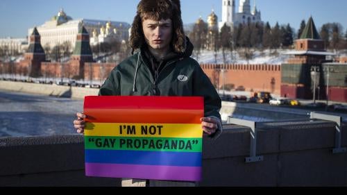 Russian blogger, Zhenya Svetski, stands with a sign reading “I am not ‘gay propaganda’” in Moscow, December 2018. 