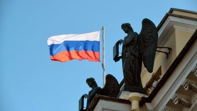 The Russian flag flies on a courthouse building in St. Petersburg, Russia, March 15 2020.