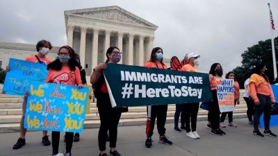 Deferred Action for Childhood Arrivals (DACA) students celebrate in front of the Supreme Court in Washington, DC, June 18, 2020. 