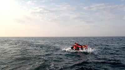 A group of people thought to be migrants crossing the Channel in a small boat headed in the direction of Dover, Kent, United Kingdom, August 10, 2020.