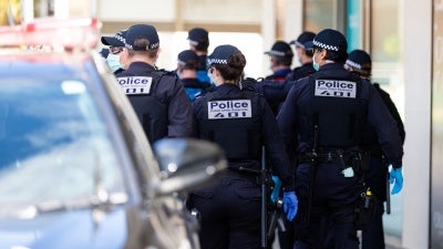 Police Public Order Response Teams respond to a small group of protesters who appeared at a shopping center and quickly dispersed before any arrests could be made during pop-up protests on September 20, 2020 in Melbourne, Australia. 