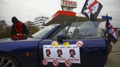Protestors prepare to take part in a car demonstration organized by Women's Strike against imposing further restrictions on abortion law in Poland. 