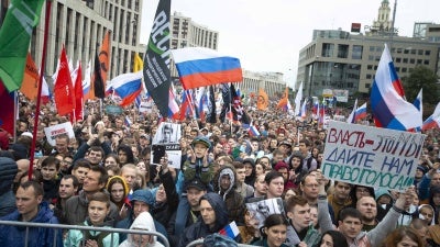 Tens of thousands of people rallied in central Moscow Russia, Saturday, Aug. 10, 2019, for the third consecutive weekend to protest the exclusion of opposition and independent candidates from the Russian capital's city council ballot.