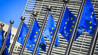 European Union flags are waving in front of the headquarters of the European Commission in Brussels. August 5, 2020. 