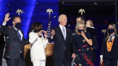 Biden with Kamala Harris. Indoors. People Standing.