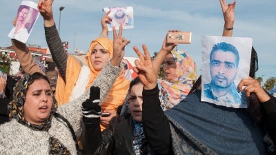Relatives of Sahrawi prisoners of the Gdeim Izik group outside a tribunal in Salé, Morocco, in December 2016.