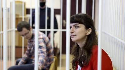 Belarusian journalist Katsiaryna Barysevich, right, and Dr. Artsiom Sorokin attend a court hearing in Minsk, Belarus, 19 February, 2021.