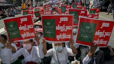 Anti-coup protesters stage a sit-in demonstration, Mandalay, Myanmar, February 24, 2021.