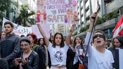 Activists take part in a demonstration against sexual harassment, rape, and domestic violence in the Lebanese capital Beirut on December 7, 2019.