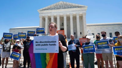 Human Rights Campaign Legal Director Sarah Warbelow speaks at a rally on the steps of the Supreme Court on Thursday, June 17, 2021 in Washington, D.C. following the Fulton decision.