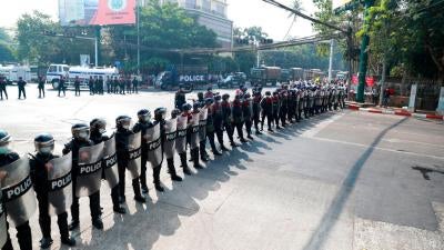 Myanmar police block a road near the US embassy in Yangon, Myanmar, February 22, 2021.