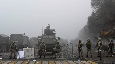 Troops are seen at the main square in Almaty, Kazakhstan where hundreds of people were protesting against the government, after authorities' decision to lift price caps on liquefied petroleum gas, January 6, 2022.