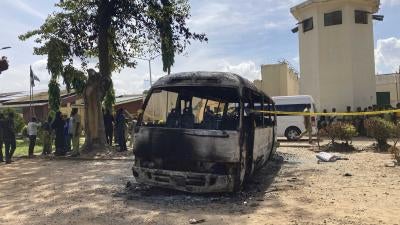 A burned-out bus outside Kuje prison following a jail break, Kuje, Nigeria, July 6, 2022. 