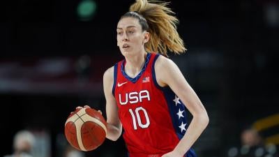 Breanna Stewart, US national basketball player dribbles basketball on court