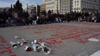 Flowers and the names of the victims of the Tempi train accident are displayed during a sit-in protest organized by the Association of Relatives of the Tempi Victims in Athens, Greece, January 26, 2025.