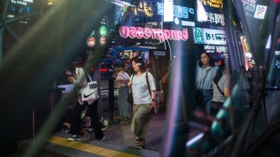 Commuters enter the Gangnam metro station in Seoul, South Korea, September 14, 2023.