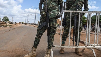 Nigerien police stand guard in Niamey.
