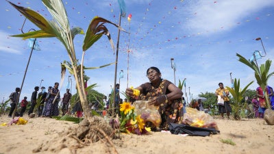 Families mourn victims of Sri Lanka’s 1983-2009 civil war on the beach at Mullivaikal where the final battle took place, May 17, 2024. 