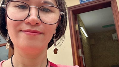 Hoang Thi Hong Thai outside the police interrogation room in Hanoi, April 2025.