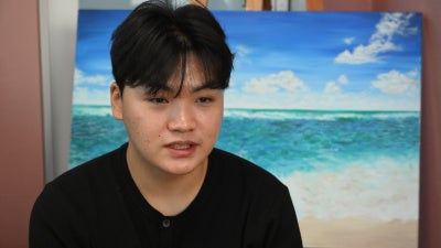 Kim Geum Sung at home in Seoul, South Korea, talking about his mother, who is detained in China.