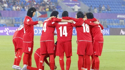 Iranian players huddle before the AFC Women's Asian Cup Australia 2026 football match between Iran and the Philippines on the Gold Coast on March 8, 2026.