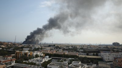 Smoke rises after Iran launched a missile attack targeting the headquarters of the US Navy Base in Manama, Bahrain about 3 mi/5 km away from Dry Rock Prison, February 28, 2026. 