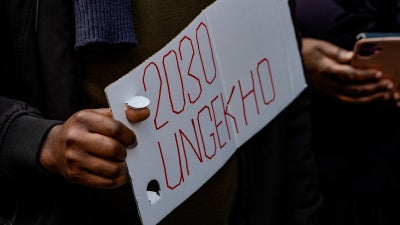 People protest the proposed Zimbabwe constitutional amendment extending the presidential term, London, April 18, 2026.
