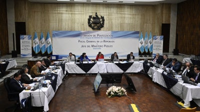 Members of the Nominating Commission review the files of candidates for attorney general of the Republic and head of the Public Prosecutor's Office at the Palace of Justice in Guatemala City on April 17, 2026. 