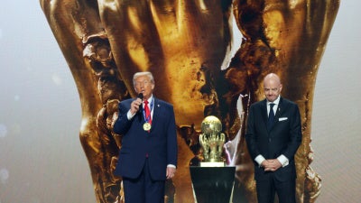 FIFA President Gianni Infantino and US President Donald Trump on stage during the FIFA World Cup 2026 official draw on December 5, 2025 in Washington, DC.