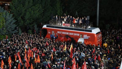 Özgür Özel addresses supporters outside the Republican People's Party (CHP) headquarters in Ankara after a court decision to remove him as party leader, May 21, 2026.