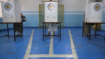 People at a polling station during a parliamentary election in Yerevan, Armenia, June 20, 2021.