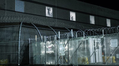 The silhouettes of detainees being held at Delaney Hall during a protest on May 30, 2026, in Newark, New Jersey.