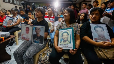 Family members of “drug war” victims watch the livestream of former Philippine President Rodrigo Duterte’s initial appearance at the International Criminal Court for alleged crimes against humanity, in Quezon City, Philippines, March 14, 2025. 