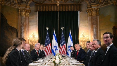 US President Donald Trump (center-right) meets with Israeli Prime Minister Benjamin Netanyahu (center-left) during a bilateral meeting at Trump's Mar-a-Lago residence in Palm Beach, Florida, on December 29, 2025.