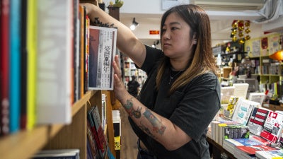 Leticia Wong, a former pro-democracy district councillor, at her bookstore in Hong Kong, June 20, 2025. 