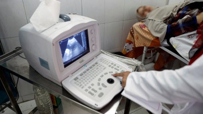  A doctor examines a pregnant woman at a hospital in the province of Fayoum, southwest of Cairo, Egypt February 19, 2019.