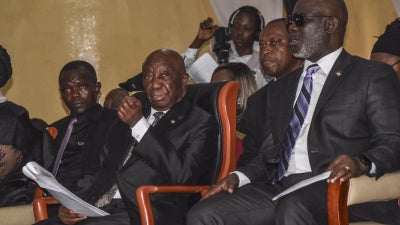 Liberian President Joseph Boakai (second from the left) and Liberian Speaker for the House of Representatives Richard Nagbe Koon (right) in Zwedru on June 27, 2025. 