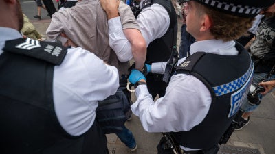 A person is detained during a Palestine Action demonstration at Marylebone Road in London, UK, July 30, 2026.