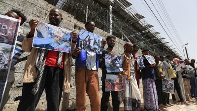 Members of Yemen's African community protest against a US airstrike that hit a migrant detention center in Saada, Yemen, May 11, 2025.
